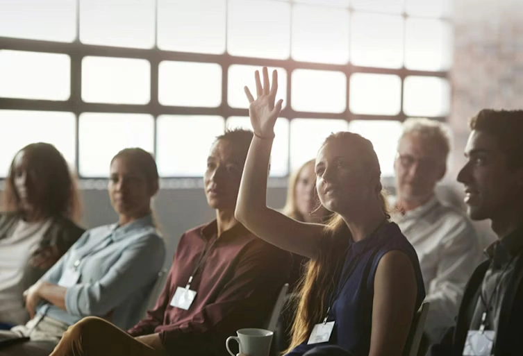 women-raising-her-hand-seats-753x513.webp